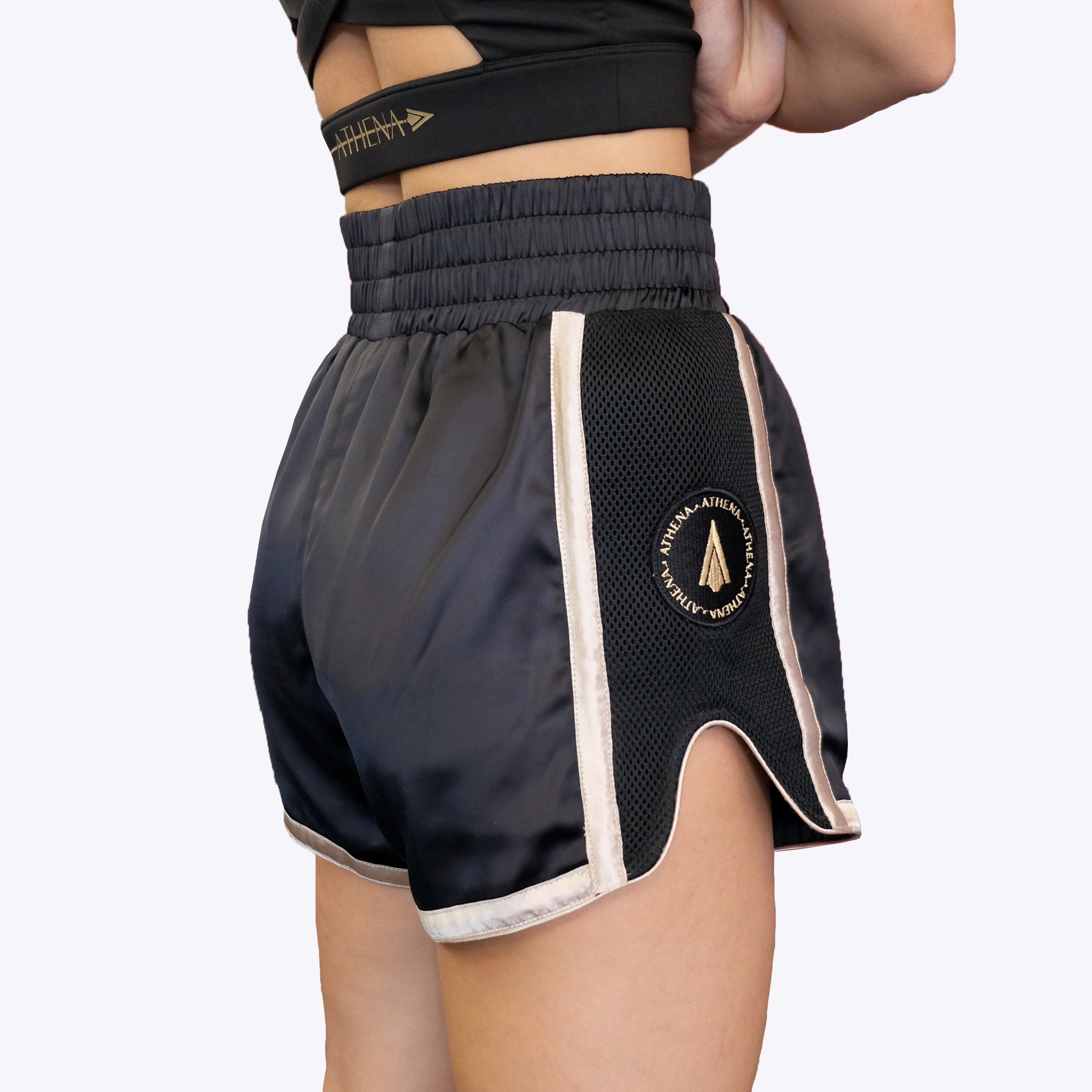 Athena Fightwear women's ladies Muay Thai shorts with wide hips and built in compression shorts warrior women black gold