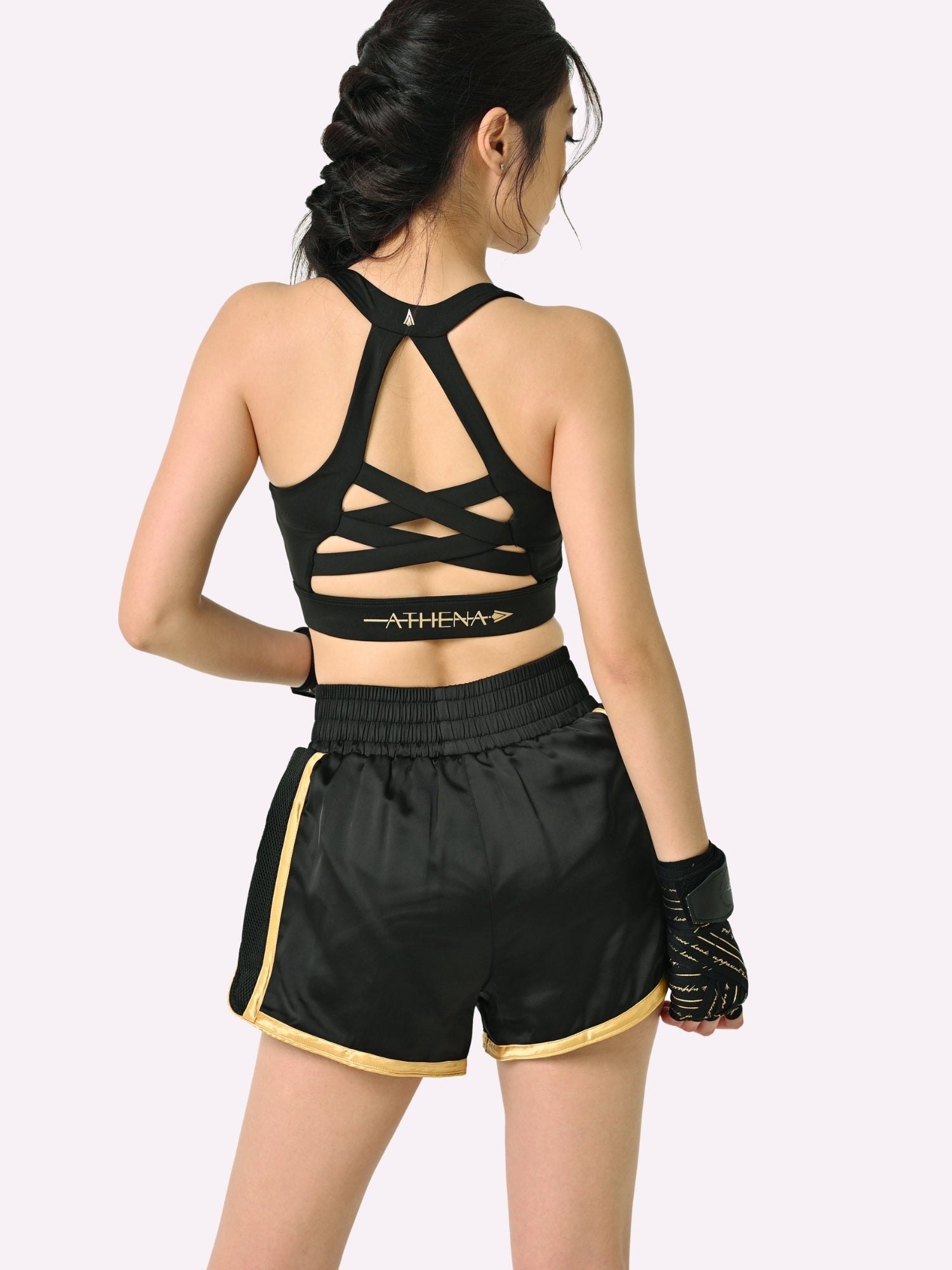 Athena Fightwear Artemisia women's Muay Thai Shorts Black & Gold with in built safety shorts anti camel toe panel pockets and anti ride up design