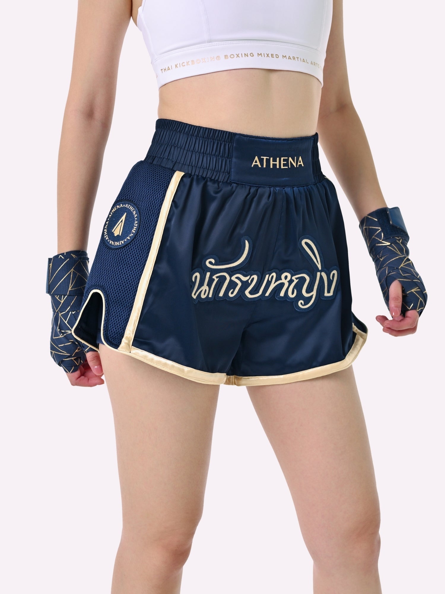 Artemisia Women's muay thai shorts navy blue and gold with wide hips and built-in safety shorts with pockets