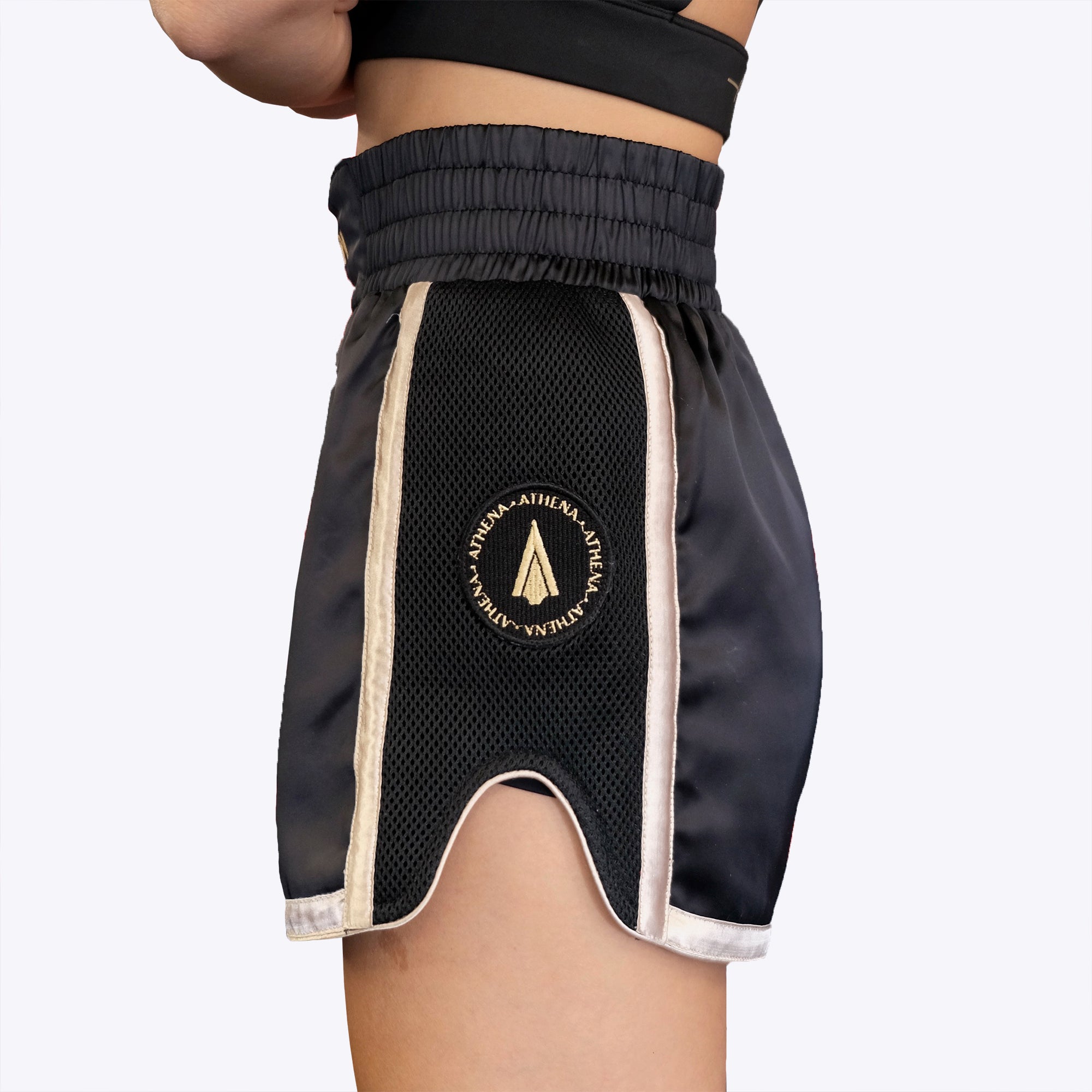 Athena Fightwear women's ladies Muay Thai shorts with wide hips and built in compression shorts warrior women black gold