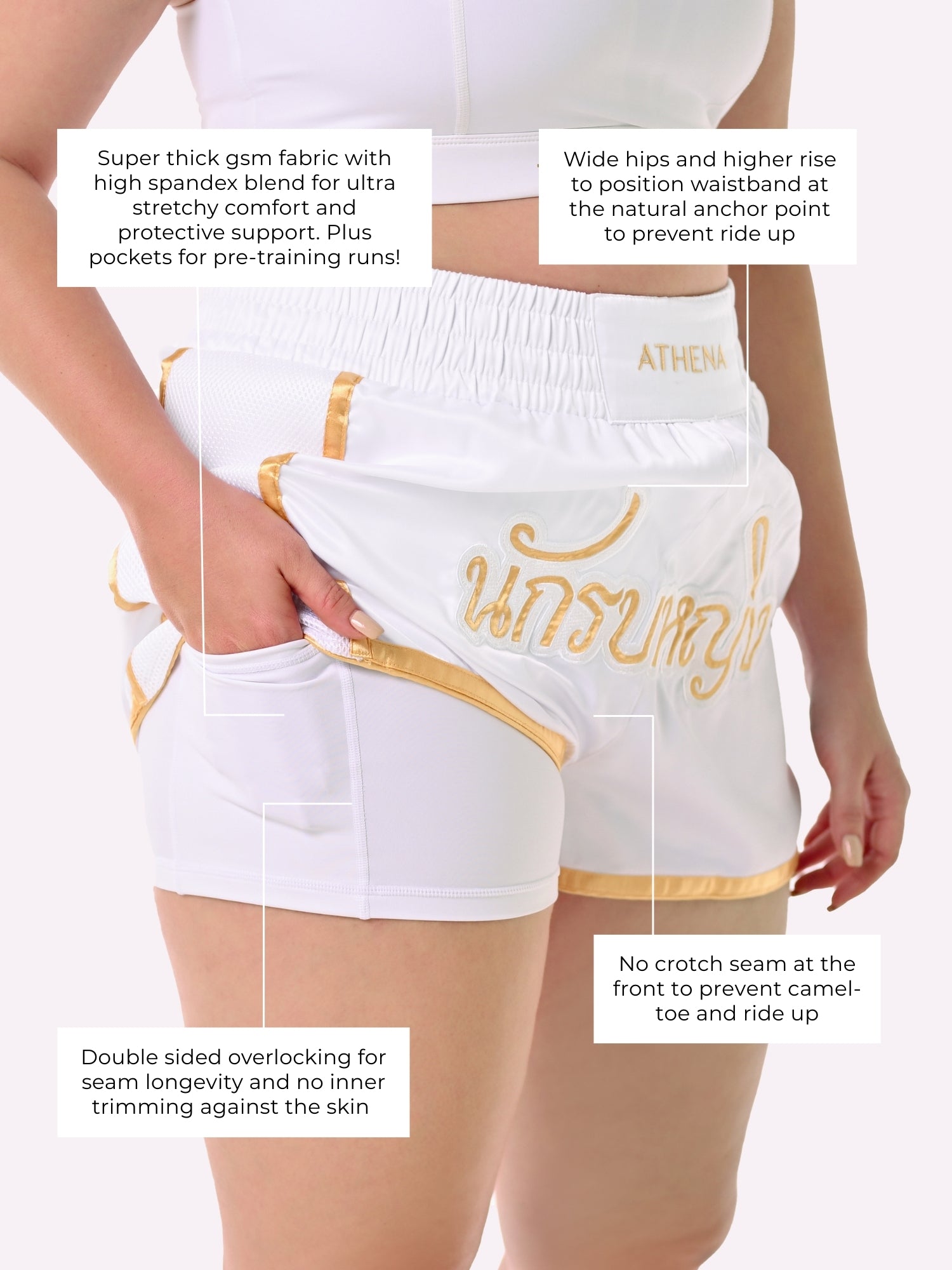 Athena Fightwear Artemisia women's white and gold muay thai shorts with wide hips and anti-camel toe built-in safety compression shorts