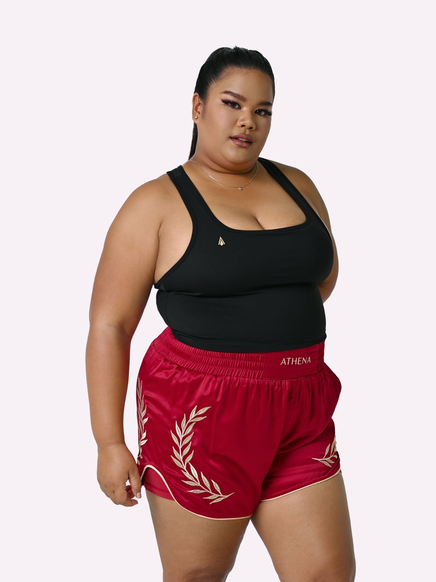 Athena Fightwear Athena Women's Muay Thai Shorts red & gold made with female waist to hip ratio wide hips built-in safety shorts with anti-camel toe and anti-ride up design and pockets