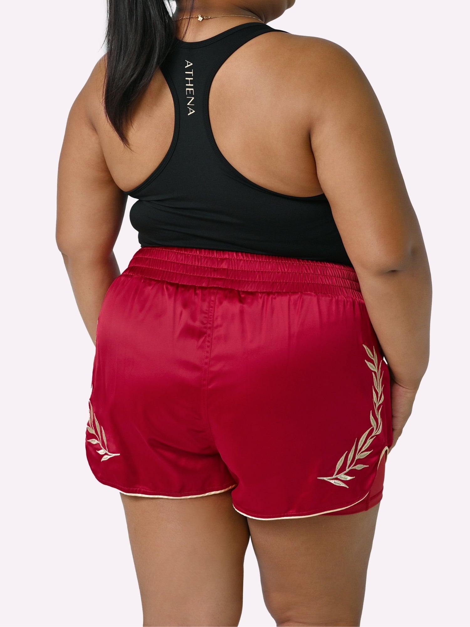 Athena Fightwear Athena Women's Muay Thai Shorts red & gold made with female waist to hip ratio wide hips built-in safety shorts with anti-camel toe and anti-ride up design and pockets