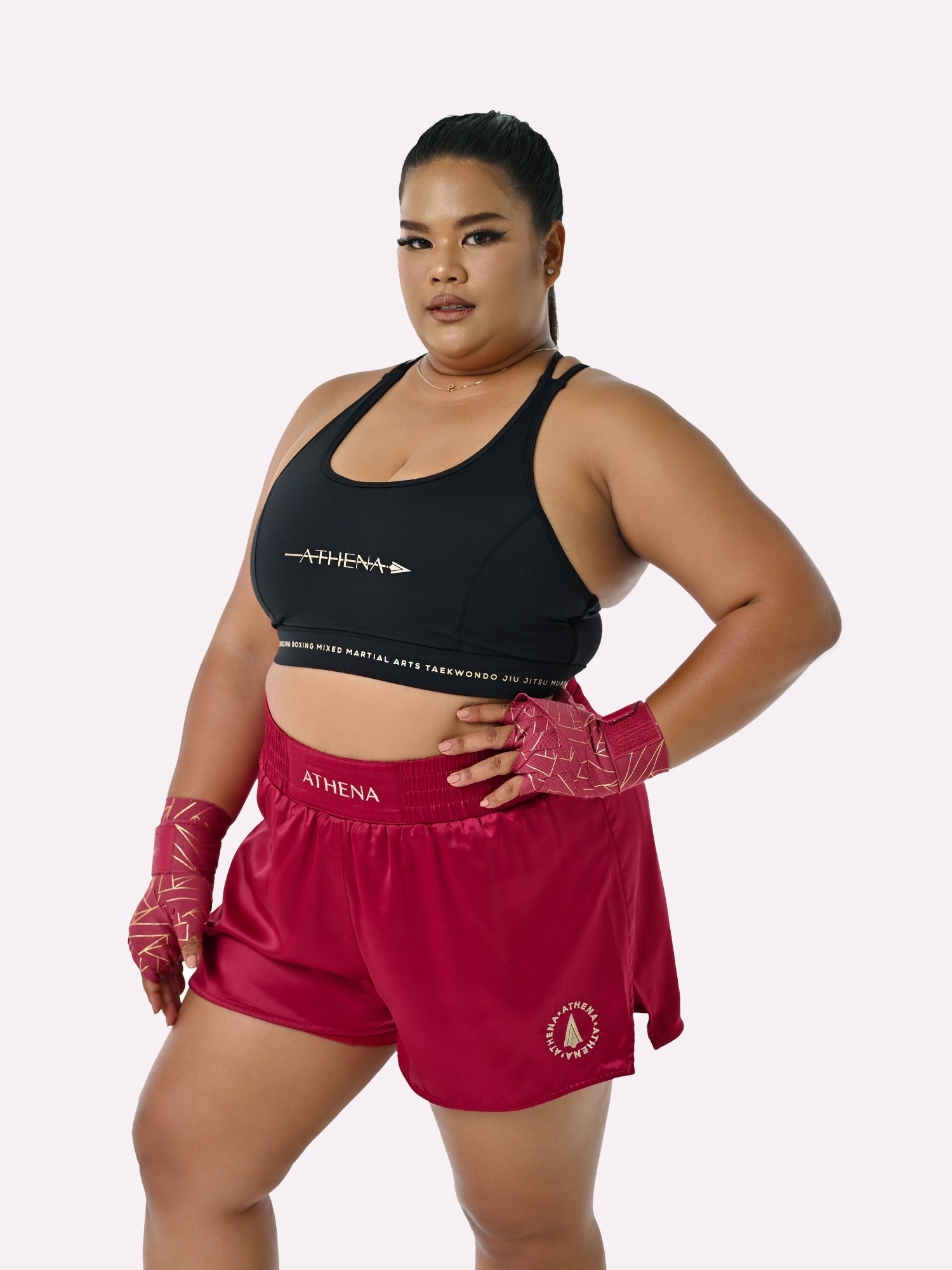 Athena Fightwear Enyo Women's Muay Thai Shorts Berry Red made for the female body with built-in anti-camel toe and anti-ride up safety shorts with pockets