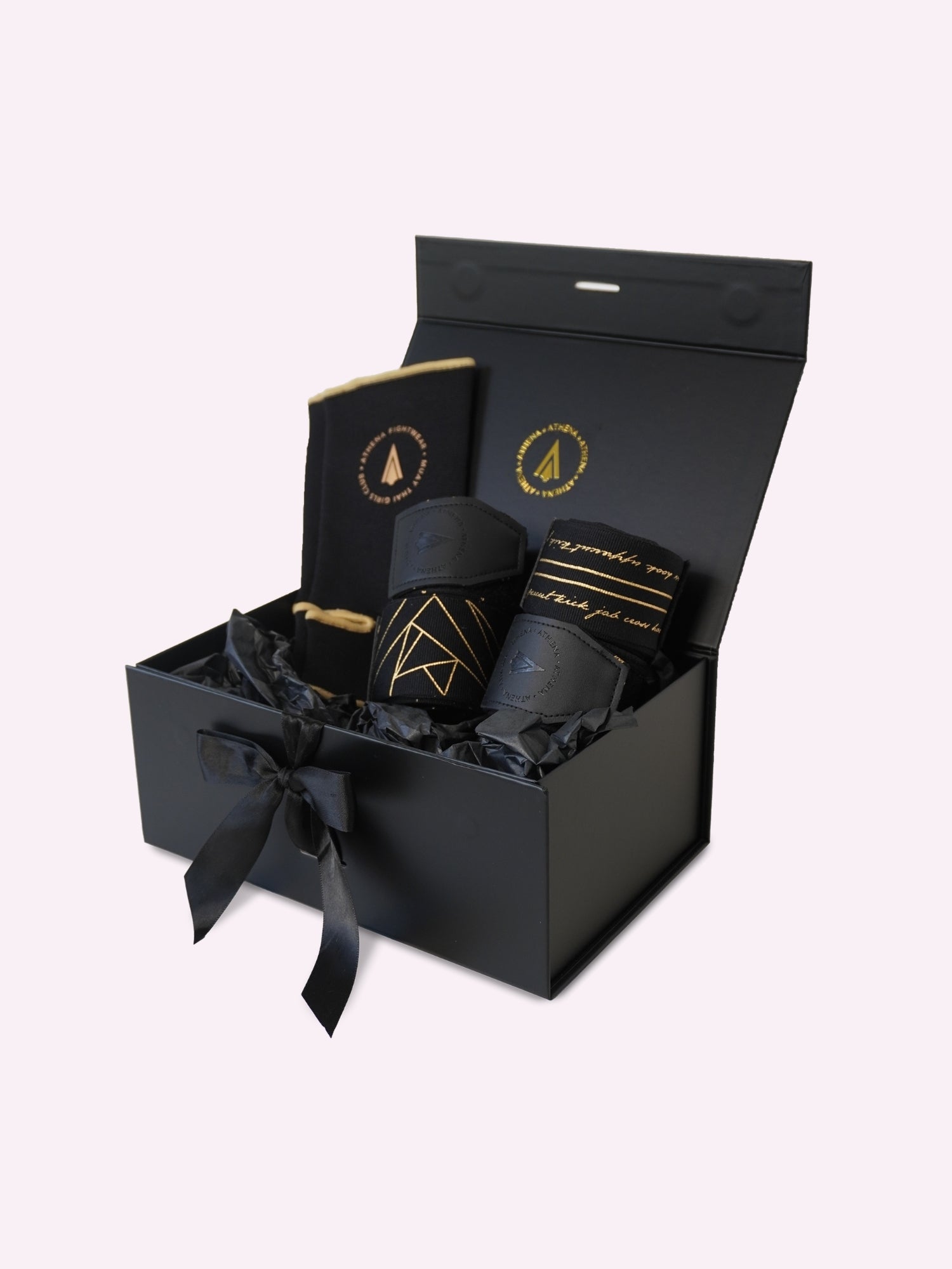 Athena Fightwear gift box with 2 black and gold hand wraps and ankle support in premium black gift box with ribbon for women and girls who love muay thai and kickboxing