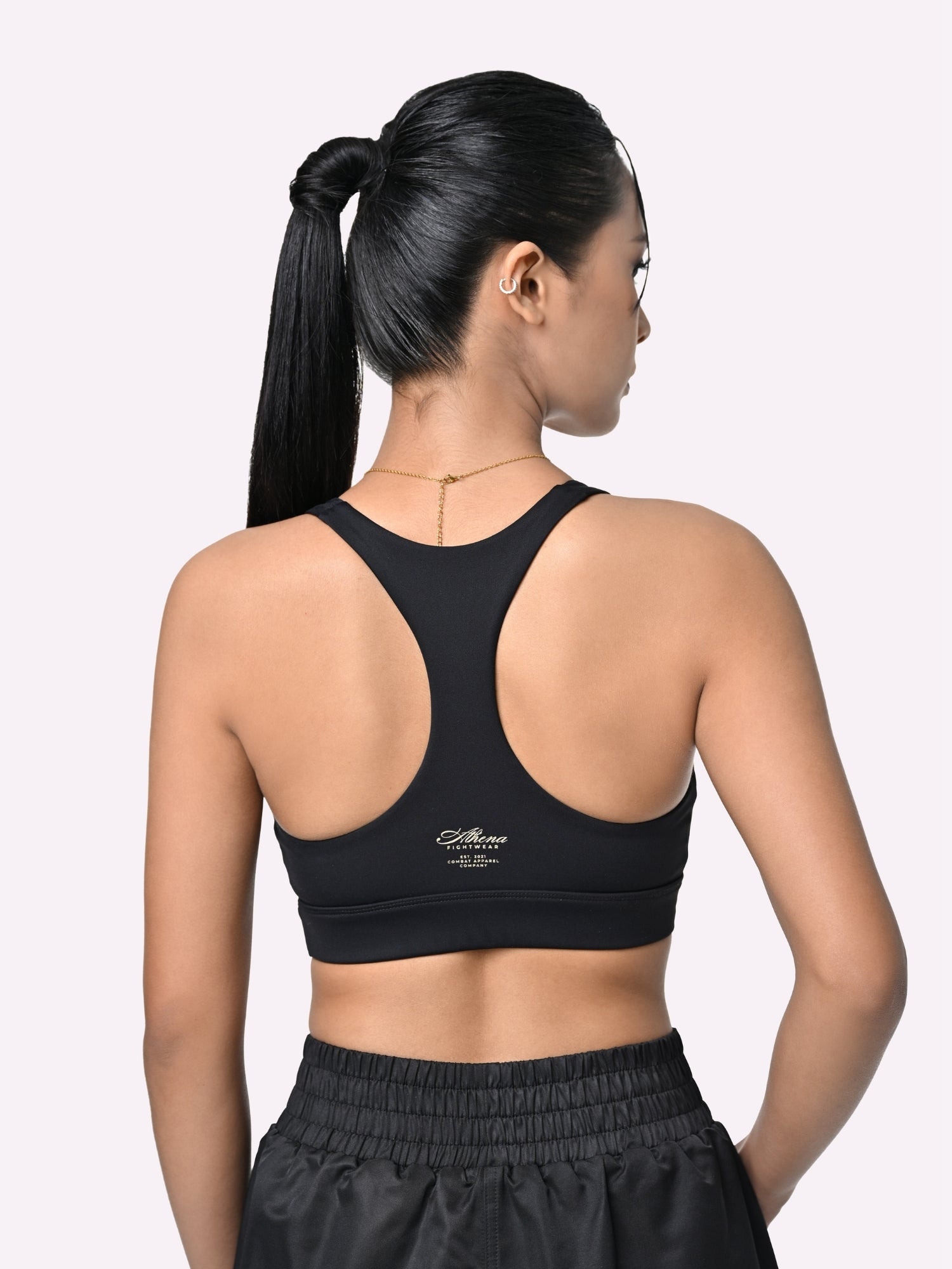 Athena Fightwear Women's V Neck Twist Plunge Sports Bra with Peekaboo and Racer Back for Boxing black and gold