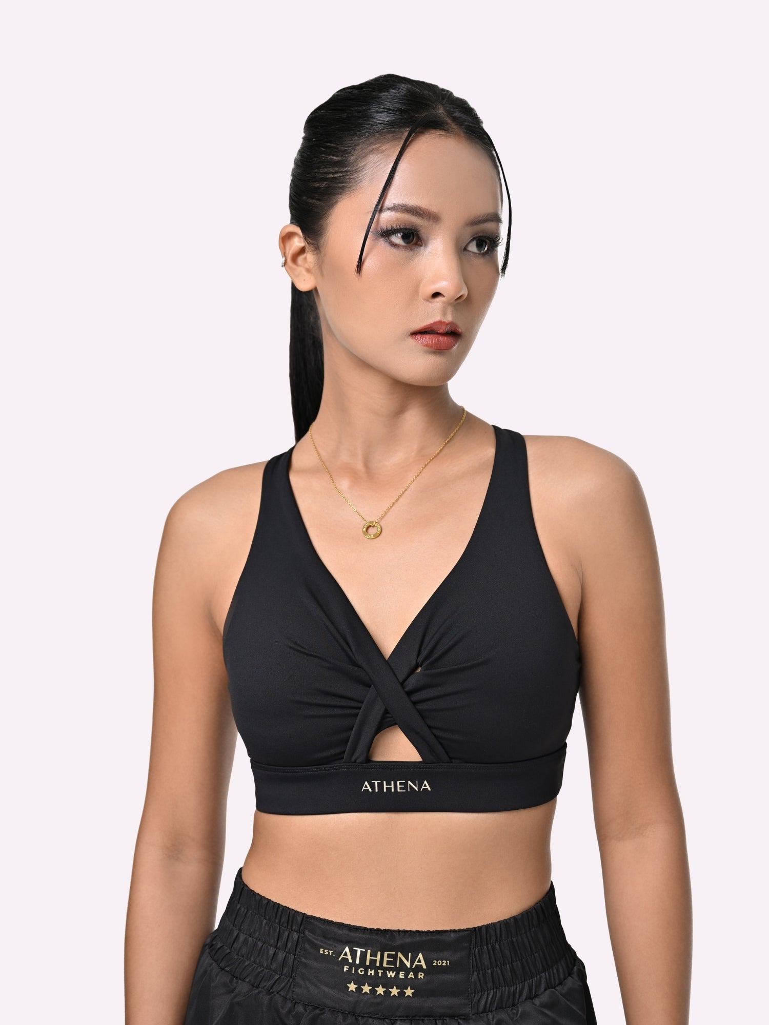Athena Fightwear Women's V Neck Twist Plunge Sports Bra with Peekaboo and Racer Back for Boxing black and gold