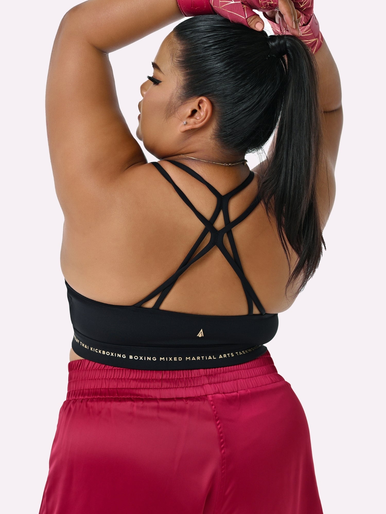 Athena Fightwear Thessalia Sports Bra black gold with built-in chest bra padding