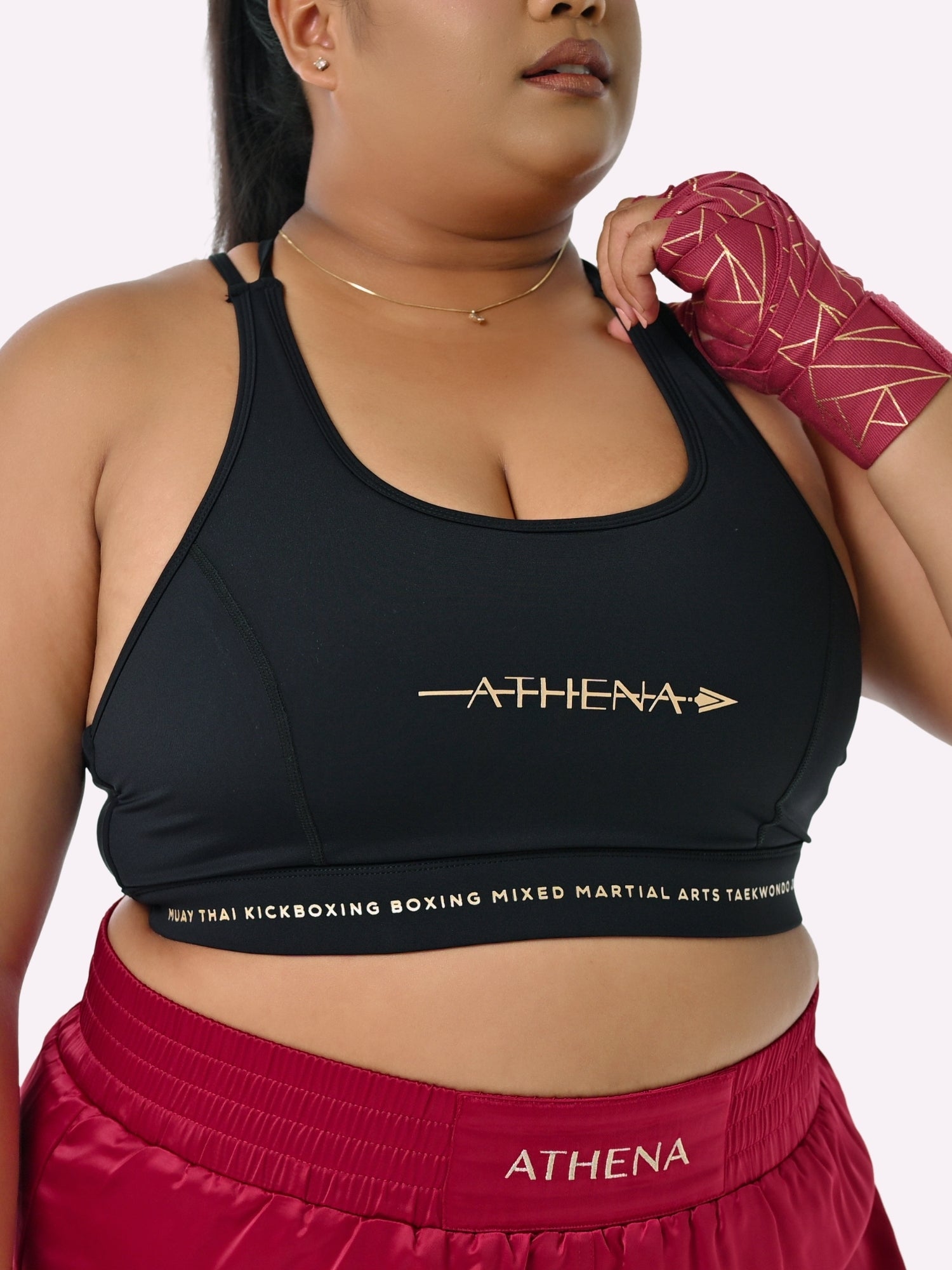 Athena Fightwear Thessalia Sports Bra black gold with built-in chest bra padding