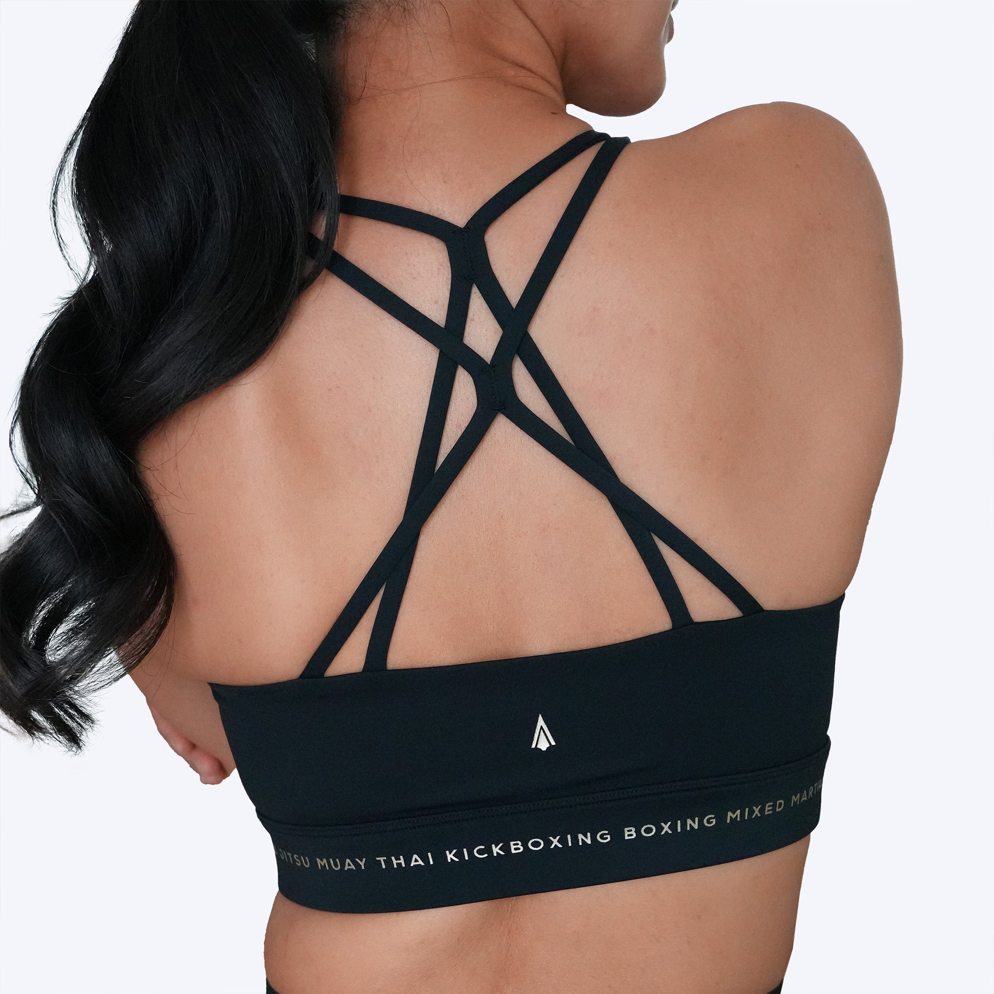 Athena Fightwear women's sports bra black gold with martial arts muay thai boxing kickboxing taekwondo karate MMA jiu jitsu BJJ