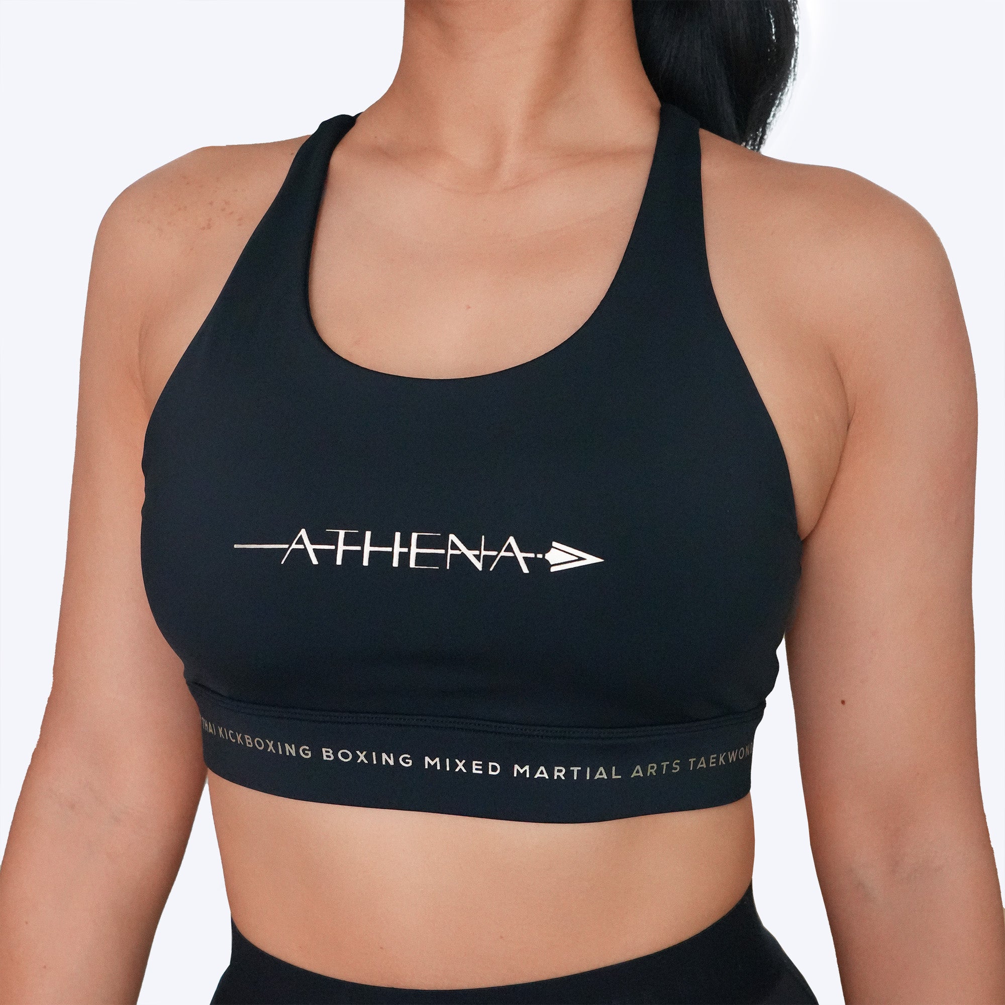 Athena Fightwear women's sports bra black gold with martial arts muay thai boxing kickboxing taekwondo karate MMA jiu jitsu BJJ
