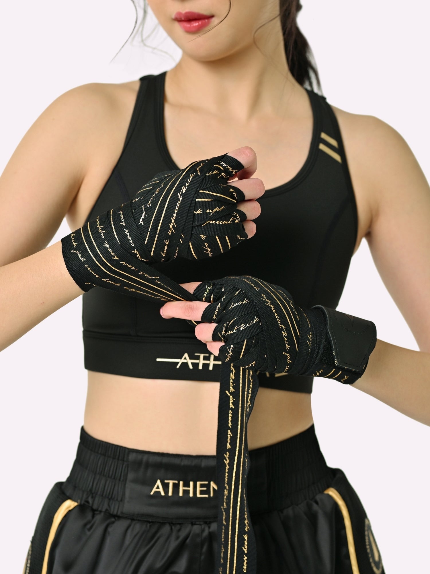 Athena Fightwear women's Eris Handwraps in Black and Metallic Gold for boxing muay thai kickboxing MMA 4.5m