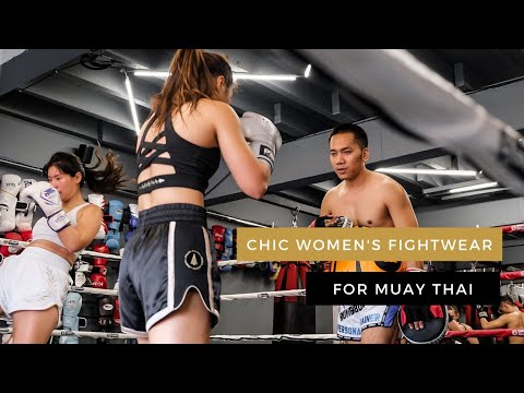 Athena Fightwear women's extra wide hip Muay Thai shorts with built in safety shorts black and gold muay thai girl