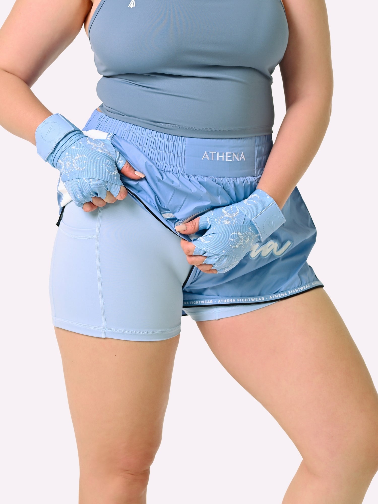 Athena Fightwear Alke Women's Muay Thai Shorts light baby blue nylon fast dry wide hips with in built safety shorts and pockets