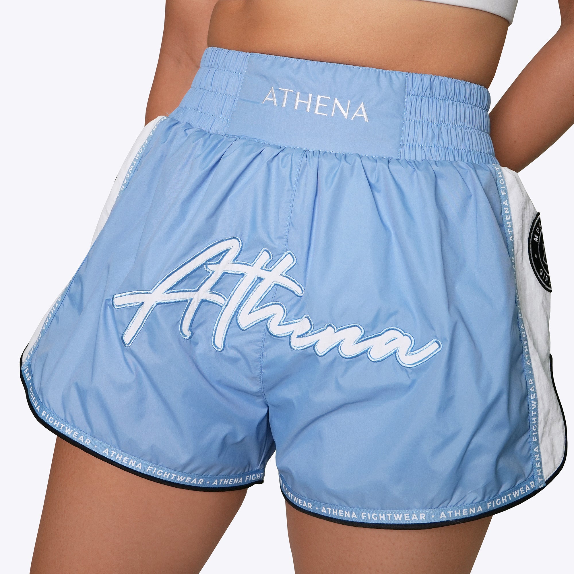 Athena Fightwear women's muay thai fight shorts light blue nylon fast drying lightweight with safety shorts