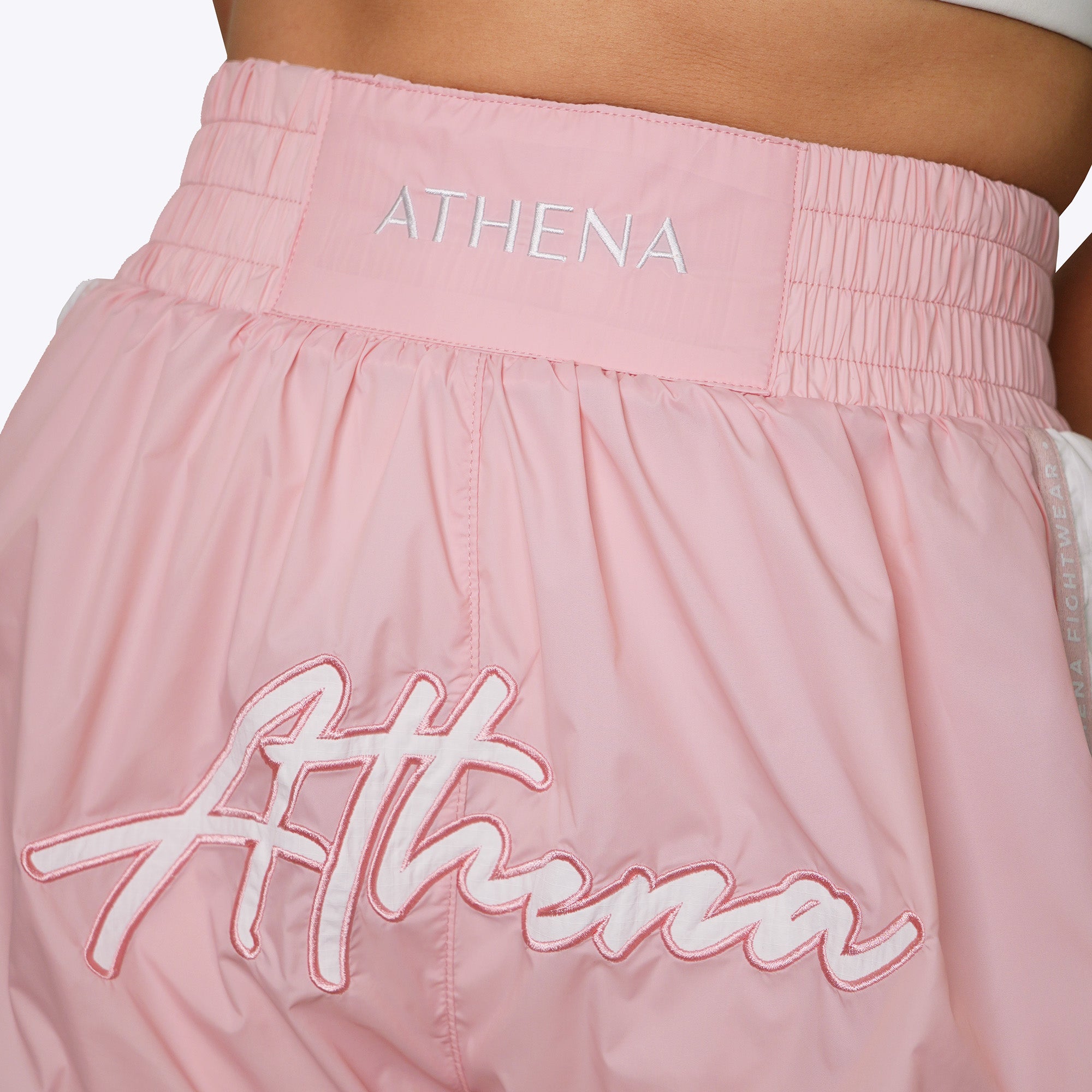 Athena Fightwear women's muay thai fight shorts light pink nylon fast drying lightweight with safety shorts