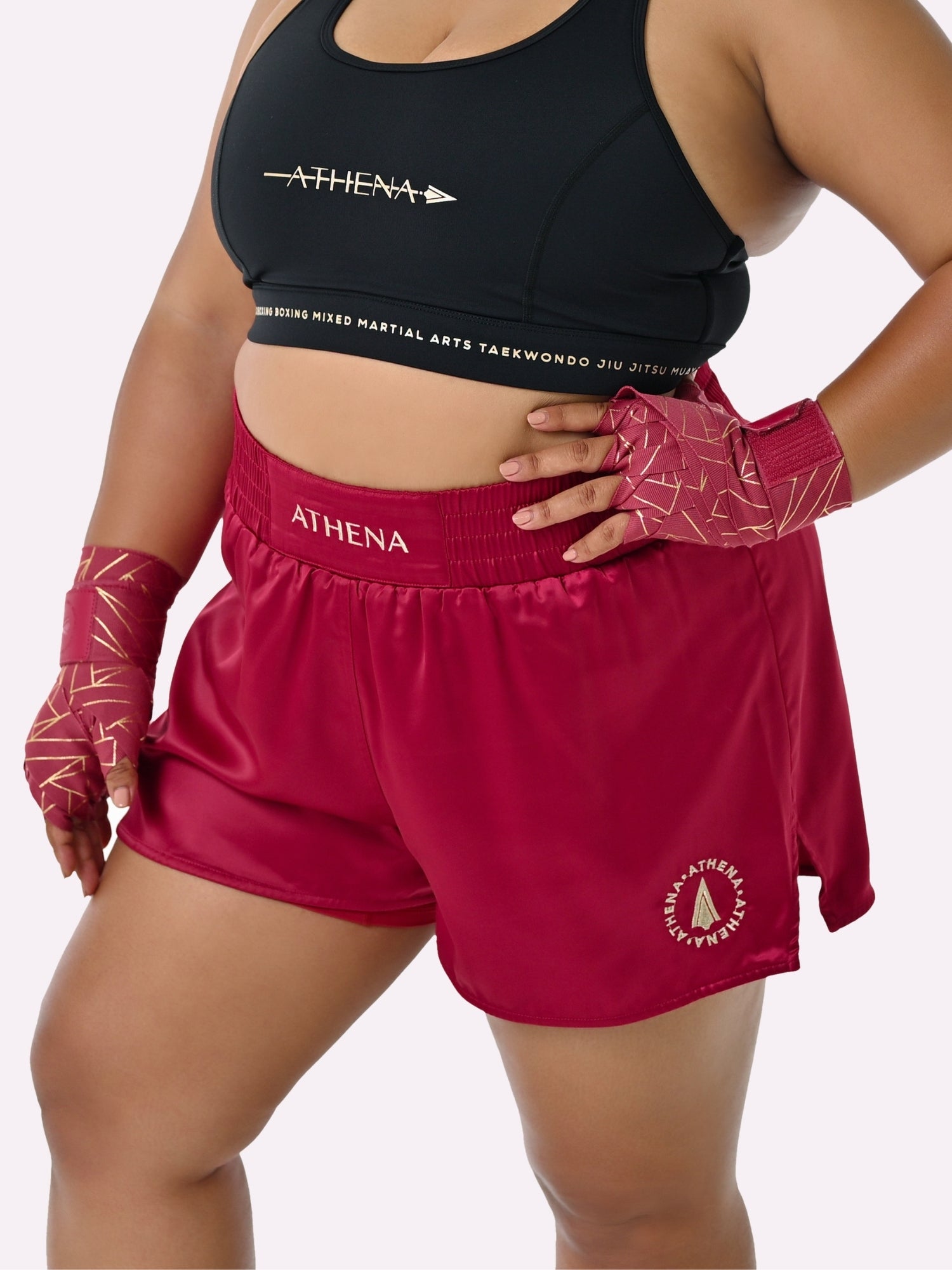 Athena Fightwear Enyo Women's Muay Thai Shorts Berry Red made for the female body with built-in anti-camel toe and anti-ride up safety shorts with pockets