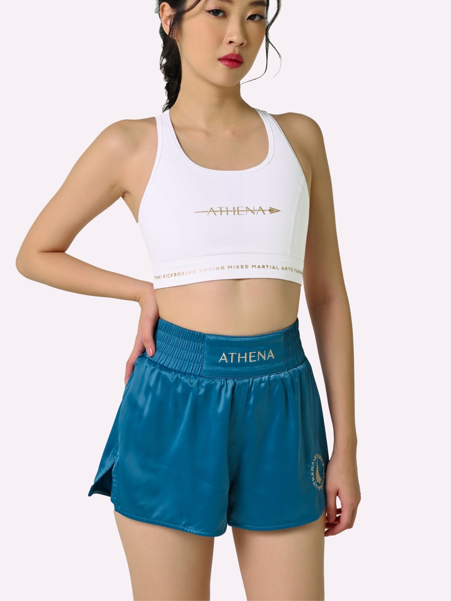 Athena Fightwear Women's Enyo Muay Thai Shorts Cerulean Blue made for the female body wide hips built-in safety shorts anti-camel toe and anti-ride up with pockets 