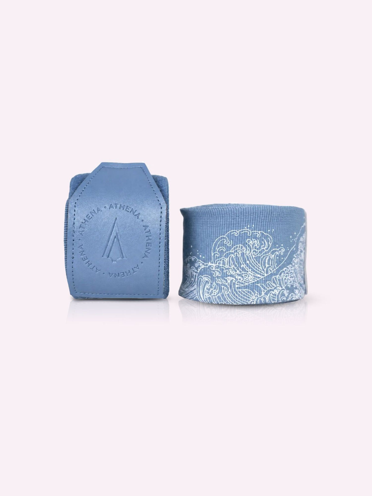 Pair of rolled Ryoko handwraps in ash blue with white Japanese wave print
