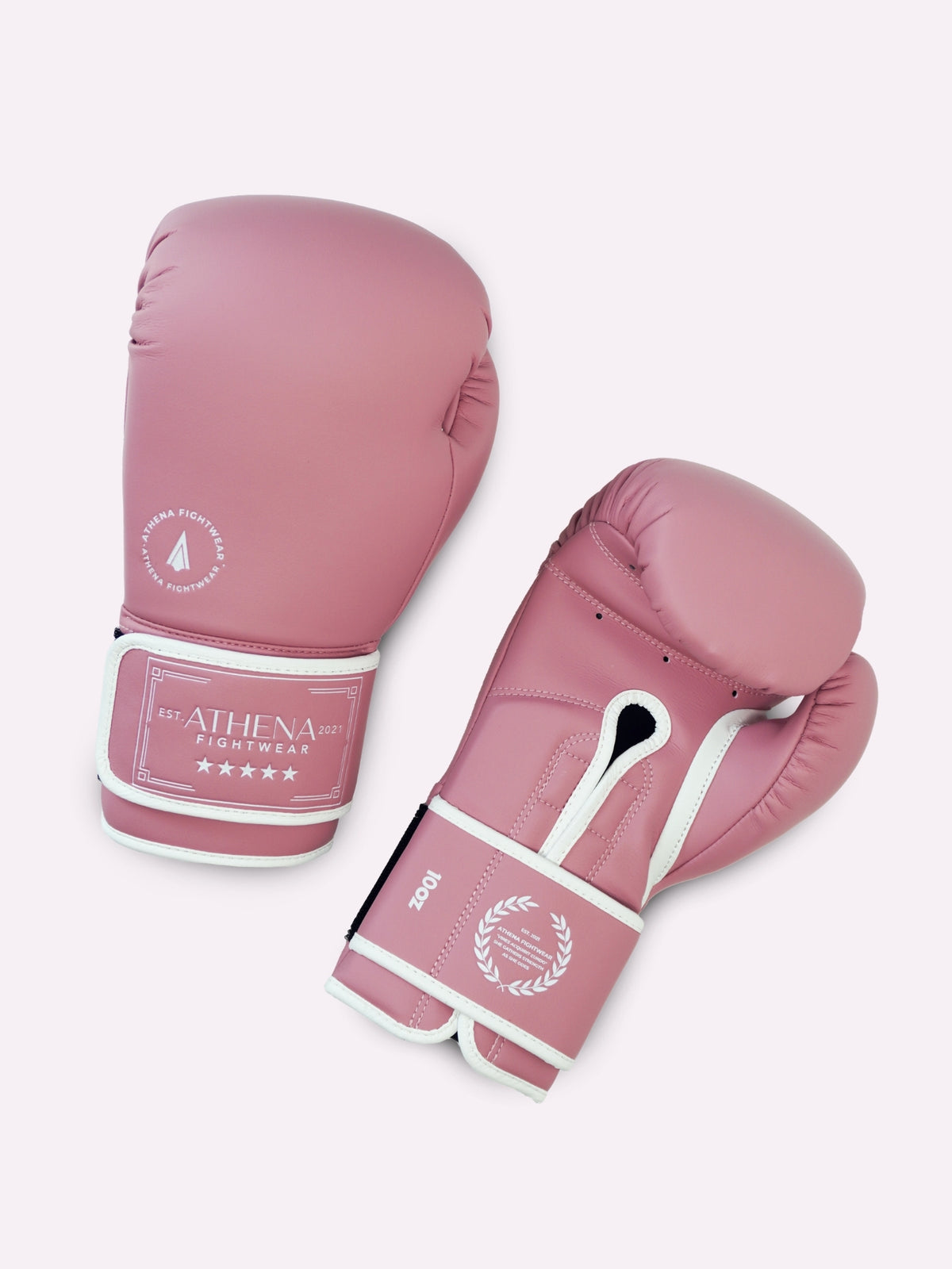 Flat lay of orchid pink Athena boxing gloves for women's boxing and Muay Thai